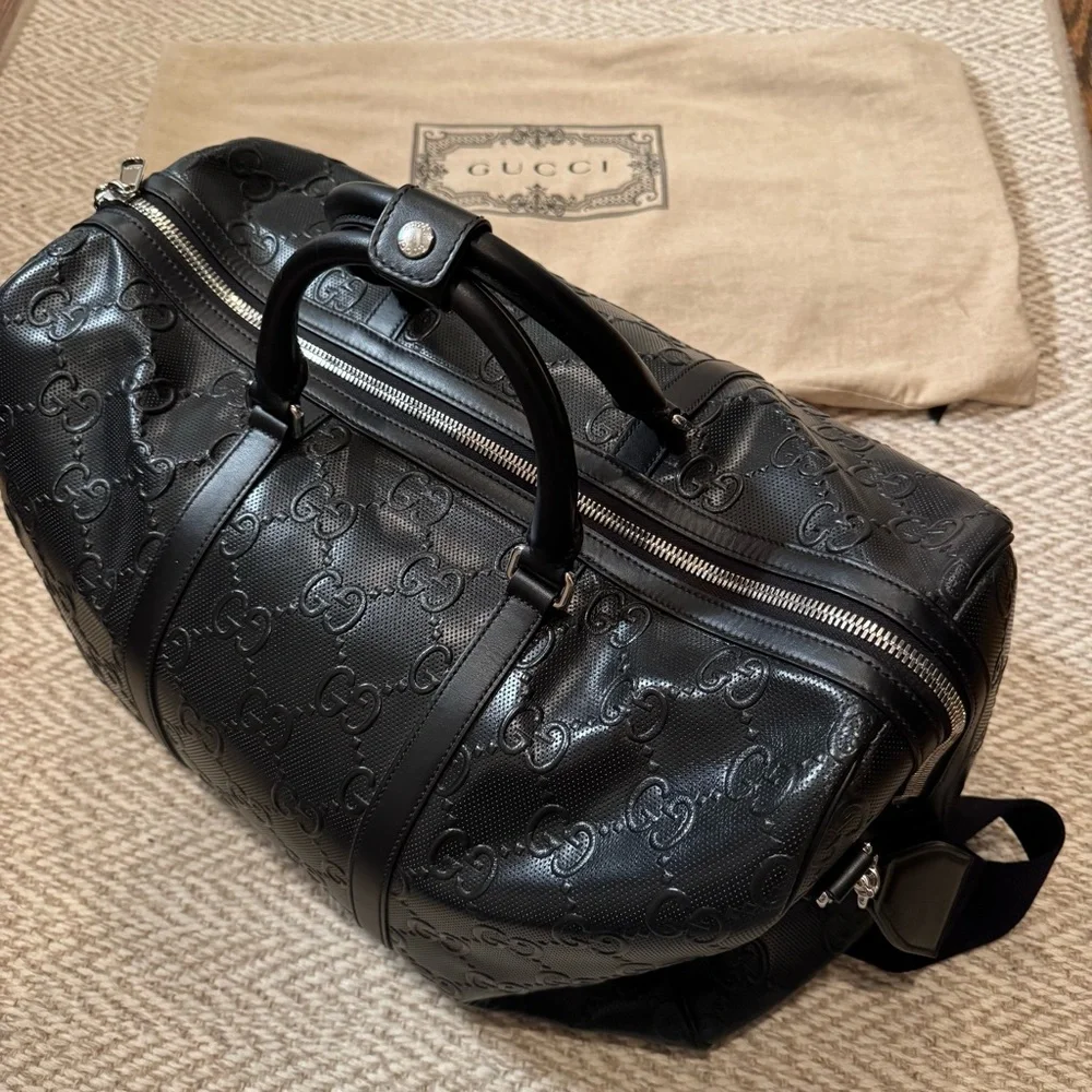 New! Gucci GG embossed black leather duffel bag